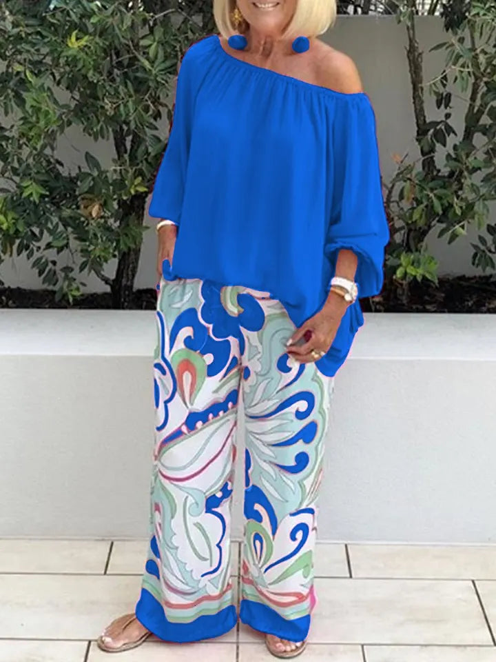 Two-piece set with women's trousers and off-shoulder top