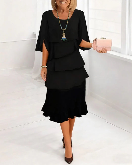 Elegante Vestido con Volantes y Cuello Redondo