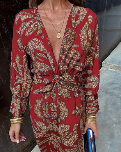 Elegant dress with long sleeves and floral print