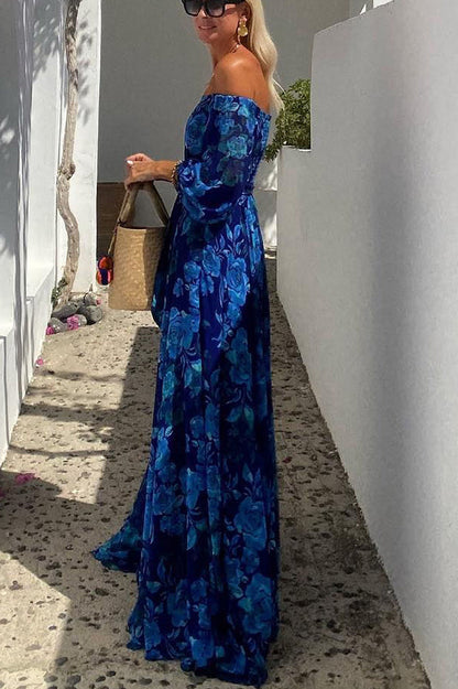 Long dress with floral print and off-the-shoulder sleeves
