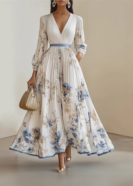 Paz™ | Vestido maxi plisado floral atemporal
