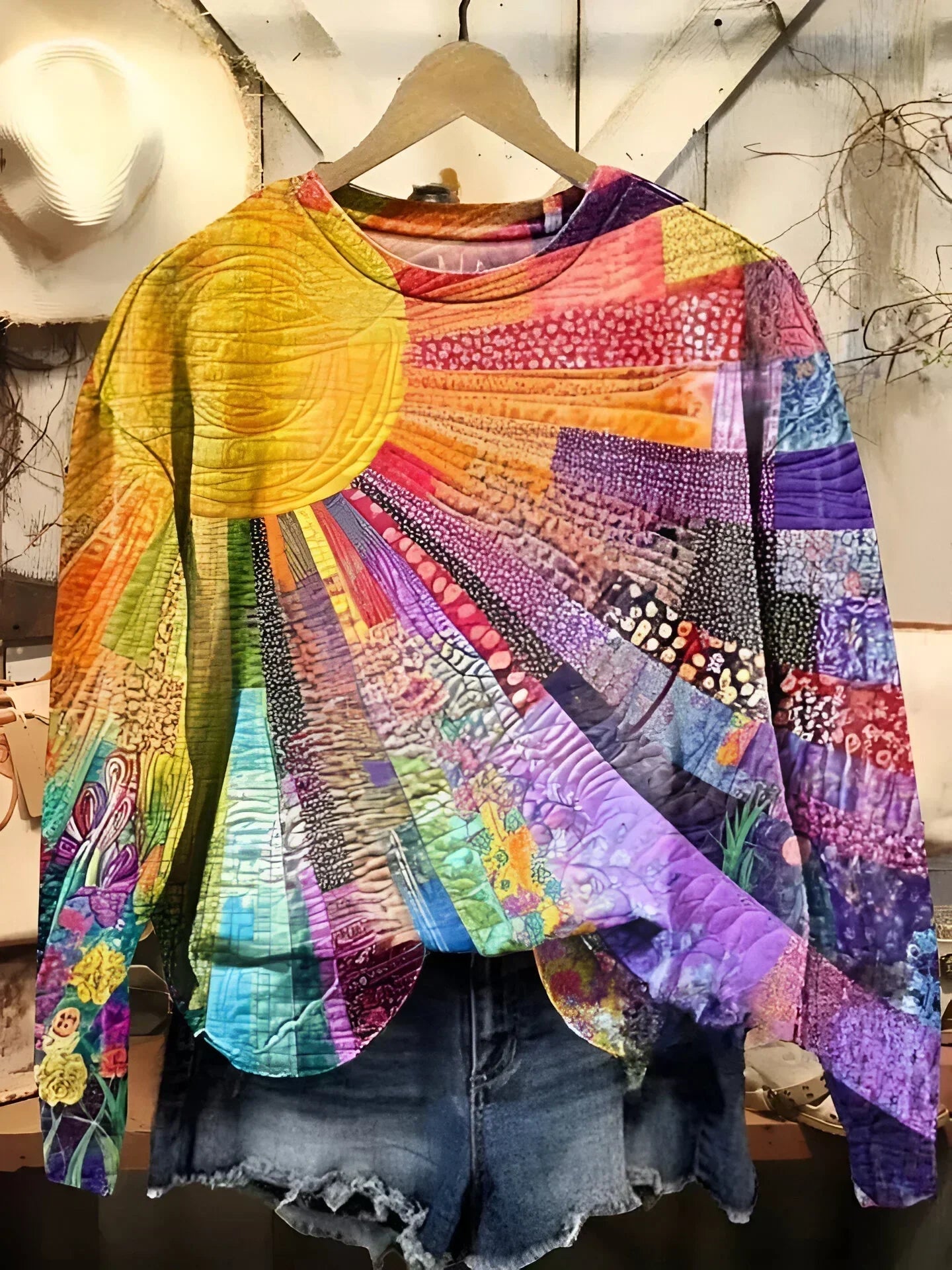 Quirine | Sudadera con collage de sol colorido